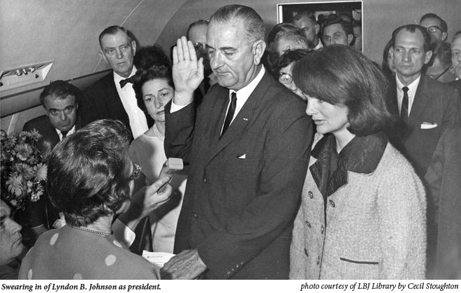 Swearing in of Lyndon B. Johnson as president.