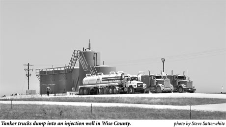 Tanker trucks dumping into an injection well
