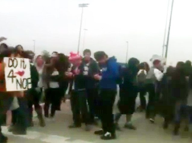 Cedar Creek High School students stage a walkout in honor of 17-year-old Noe Nino de Rivera, who was tased by a school security officer.