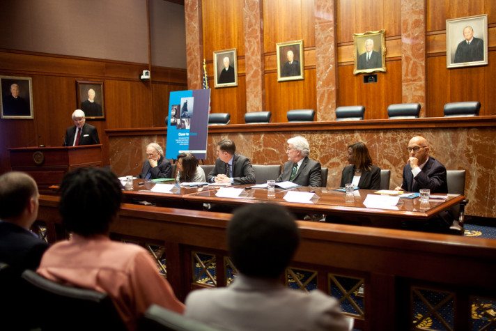 Chief Justice Nathan Hecht introduces a new study on Texas' juvenile justice system at the Texas Supreme Court, as officials and advocates look on.