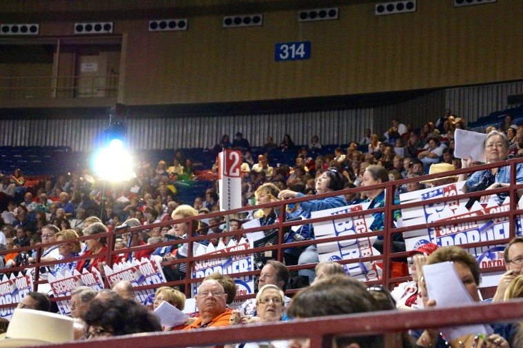 Dan Patrick's fence-shaped "Secure our Border" signs were ubiquitous at the state GOP convention last year.