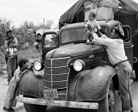 Family group moving from Texas to Wyoming for work in sugar beet fields