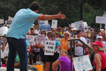 Steven Crowder, YouTube comedian and tea-party host, entertains the crowd with frenetic gesturing and the occasional off-color joke.