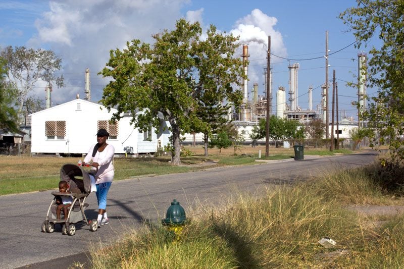 Latricia Jones and her 2-year-old son Dre'vyon in their neighborhood