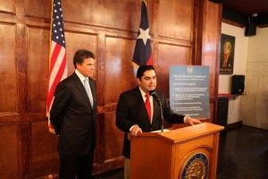 J.M. Lozano (right) with Gov. Rick Perry.