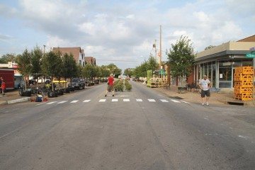 An Oak Cliff Better Block demonstration, complete with borrowed trees and shrubs, on West Davis Street.
