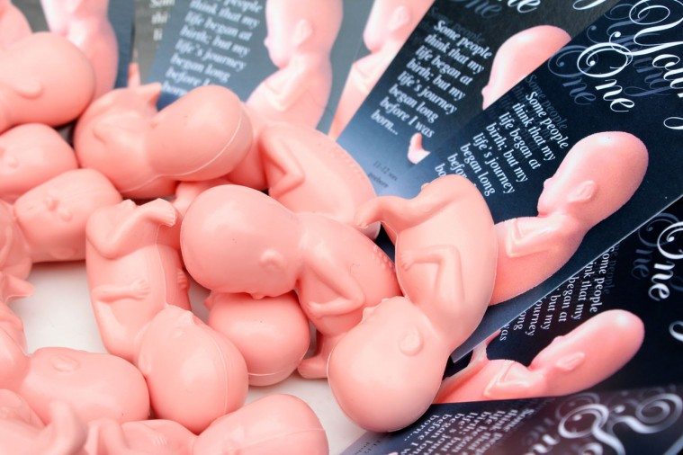 Many pro-life organizations set up tables with models, like this bowl of plastic fetuses, hoping to illustrate the point that life begins at conception. 