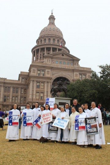 A group of nuns pose in fron of the Capitol to support the "Choose life" initiative.