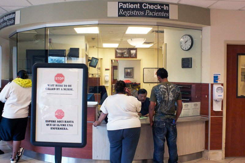 Patients check in at the Brackenridge Hospital emergency room in Austin.