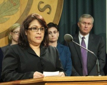 Legal services client Margarita Sanchez talks about how legal aid helped her through the court system at the Capitol Wednesday.