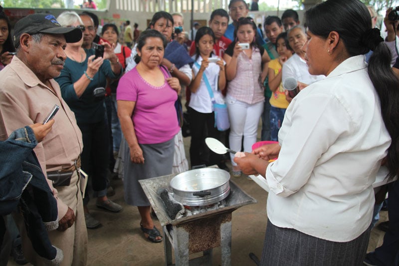 Demonstration of traditional amaranth cooking techniques.