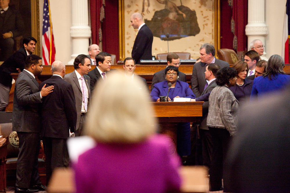 Rep. Toni Rose (D-Dallas) defends her bill to Rep. Jodie Laubenberg (R-Parker)