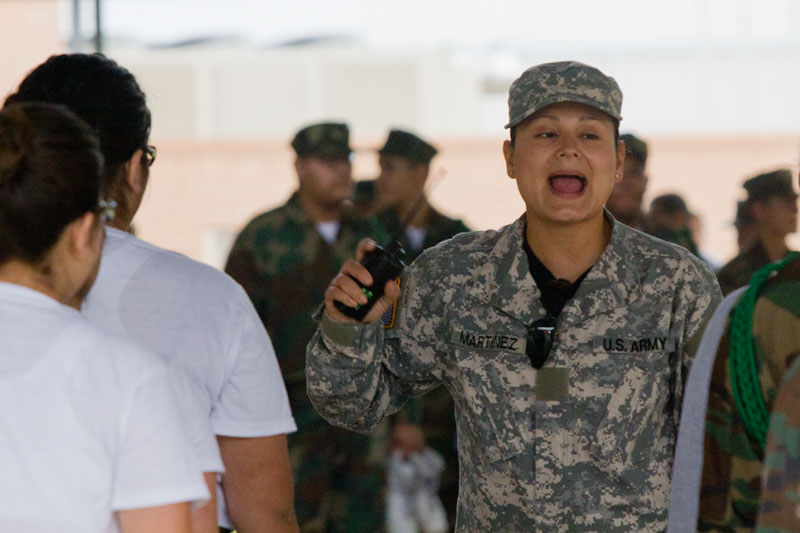 Drill Instructor Yasmine Martinez barks orders to female cadets during marching practice. Staff photo.