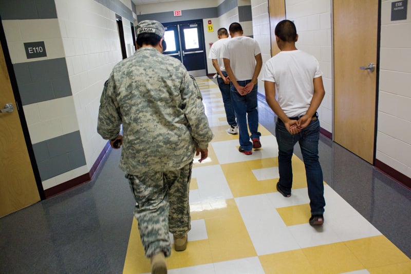 Cadets are never left unattended. Here a drill instructor accompanies cadets to another classroom.