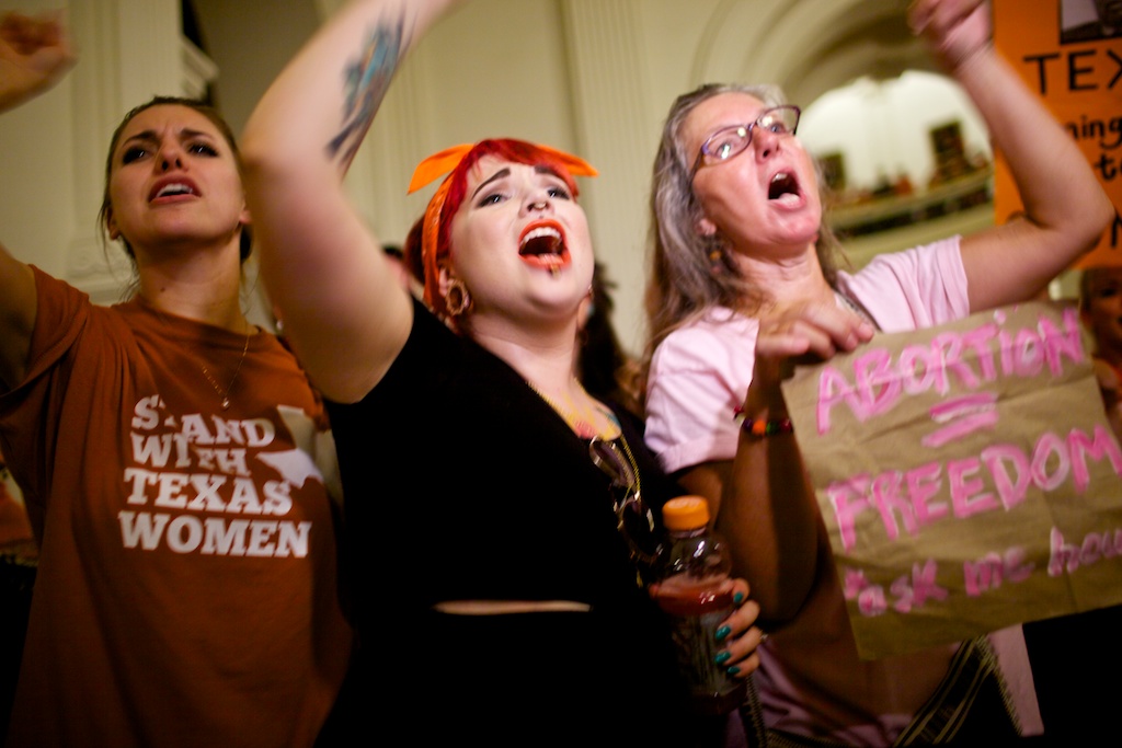 Pro-choice protesters chant outside the Senate chamber