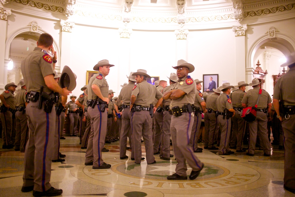 The Capitol rotunda's ground floor full of state troopers