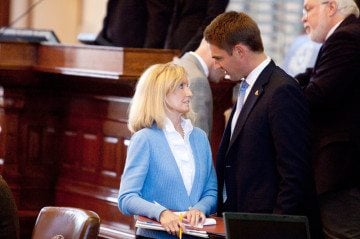 Rep. Jeff Leach (R-Plano) meets with Rep. Jodie Laubenberg (R-Parker) during debate on House Bill 2.