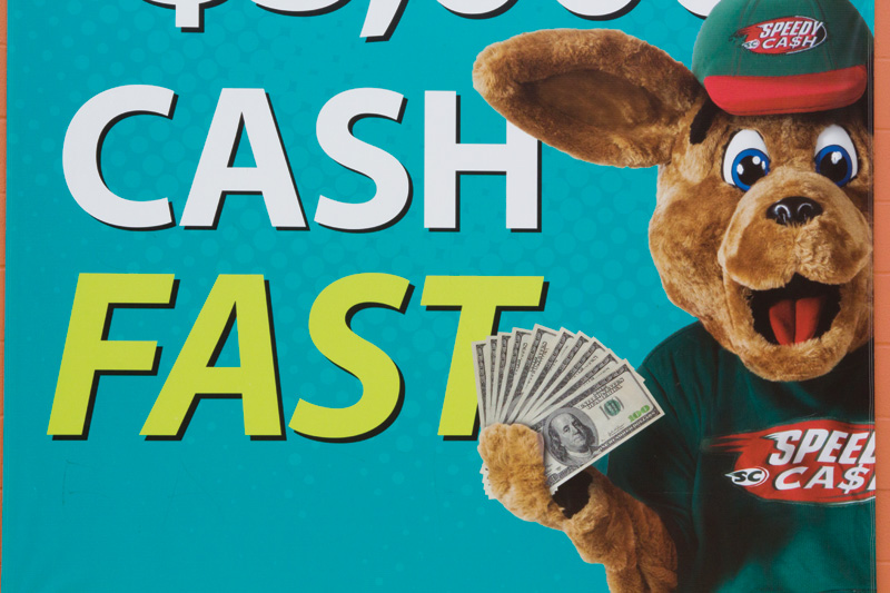 Speedy Roo, the mascot of the payday loan lender Speedy Cash, in an Austin advertisement.