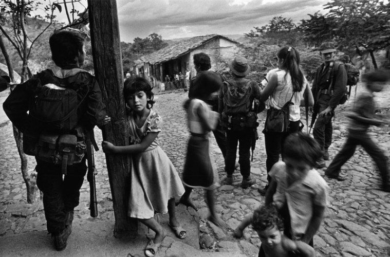 Children mingle with insurgents in the rebel-held territory.
