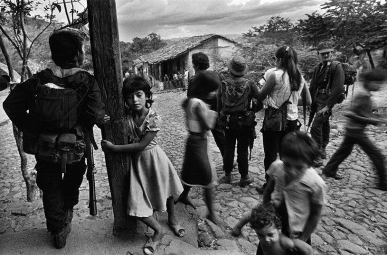 Children mingle with insurgents in the rebel-held territory. 