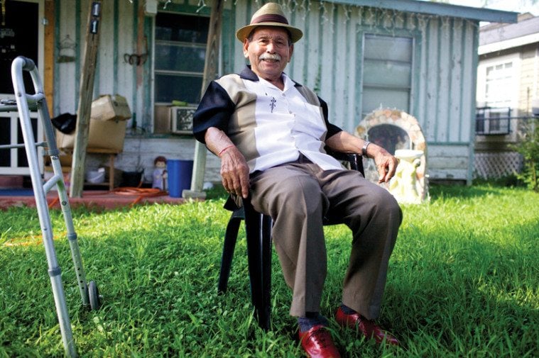Juan “Chota” Mendoza, pictured at his San Antonio home, was a member of the Los Cocos street gang in the ‘50s. Decades later, old gang members traded childhood war stories at his Los Cocos Lounge.