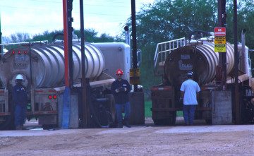 Frio County disposal well has trucks lined up and the smell of hydrogen sulfide heavy over the highway.