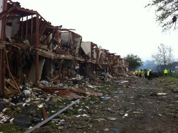 Rear of the apartment complex the following morning.