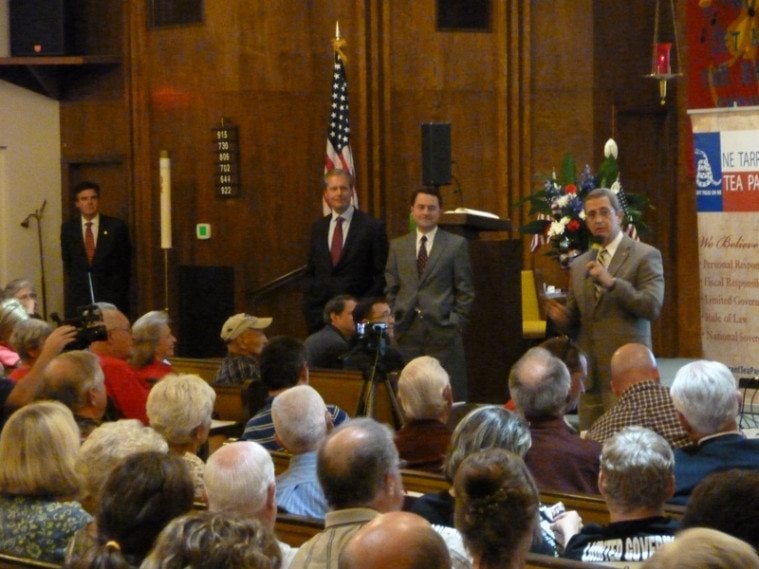 Republican candidates for Lieutenant Governor stand before a meeting of the Northeast Tarrant Tea Party on October 14. From Right to Left, state Senator Dan Patrick, Lieutenant Governor David Dewhurst, Agriculture Commissioner Todd Staples, and Land Commissioner Jerry Patterson, speaking.