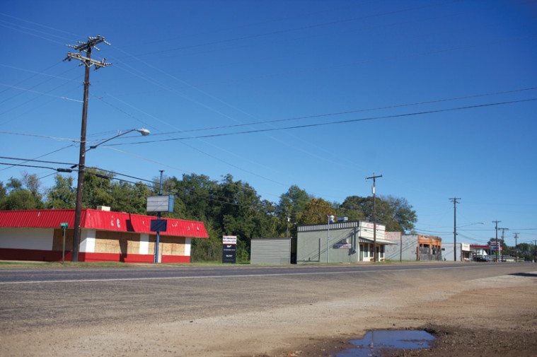 U.S. Highway 69 runs through the heart of old downtown Wells, much of it vacant today