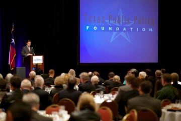 Gov. Rick Perry speaking at a TPPF summit.
