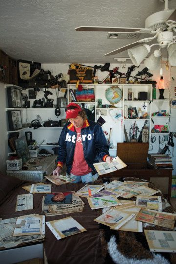 Keith Heinze at home with his music memorabilia.