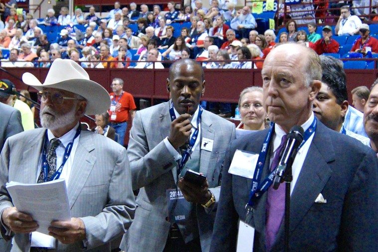 Norman Adams, left, and Steven Hotze, right, two prominent supporters of the so-called Texas Solution, at the back mic during a heated floor debate.