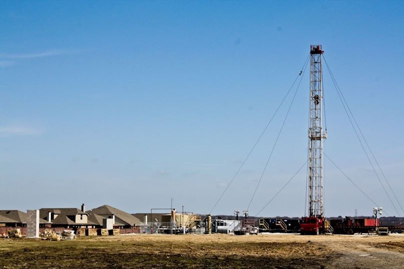 Fracking equipment near homes in Denton, in the Barnett Shale region.