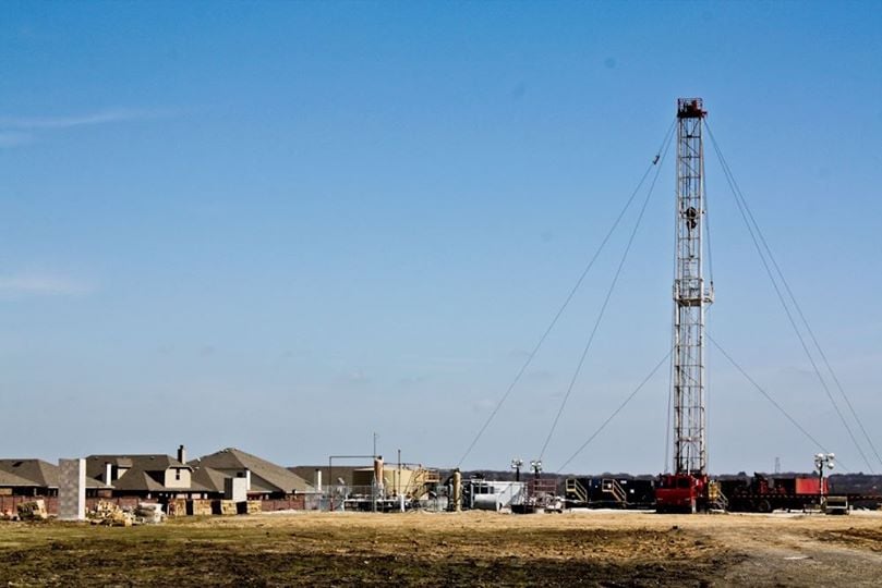 Fracking equipment near homes in Denton, in the Barnett Shale region.