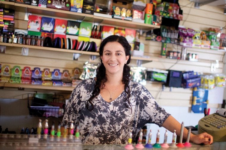 Ilana Lipsen behind her shop counter.