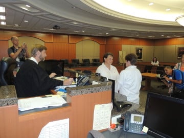 State District Judge Kyle Carter marries same-sex couple