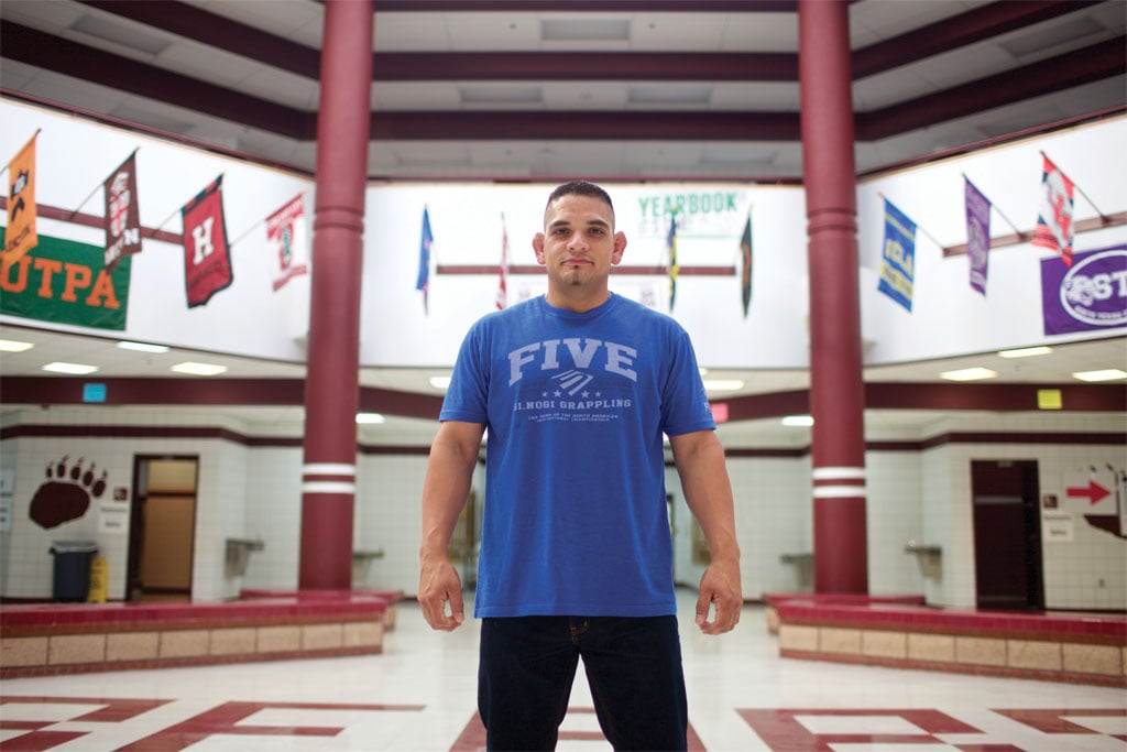 Julio Viramontes, photographed inside PSJA Early College High School, dropped out of high school in 2000 after his senior year, with only a state math test standing between him and a diploma. He returned years later, when he learned he could earn free college credit while preparing to retake the state test. He’s gone on to earn a bachelor’s degree, and begun a new career as a mixed martial arts fighter.