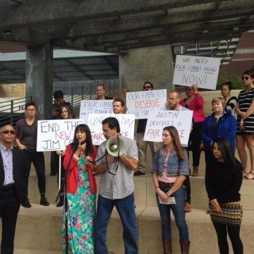 Jacqueline Conn leads a "ban the box" rally in Austin.
