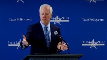 Texas Republican Senator John Cornyn, pictured above at a right-wing policy summit in 2015, and Senator Ted Cruz have done pioneering work on keeping federal judge seats open in Texas. Now that President Obama has an empty Supreme Court spot to fill, it looks like their technique is trickling up.