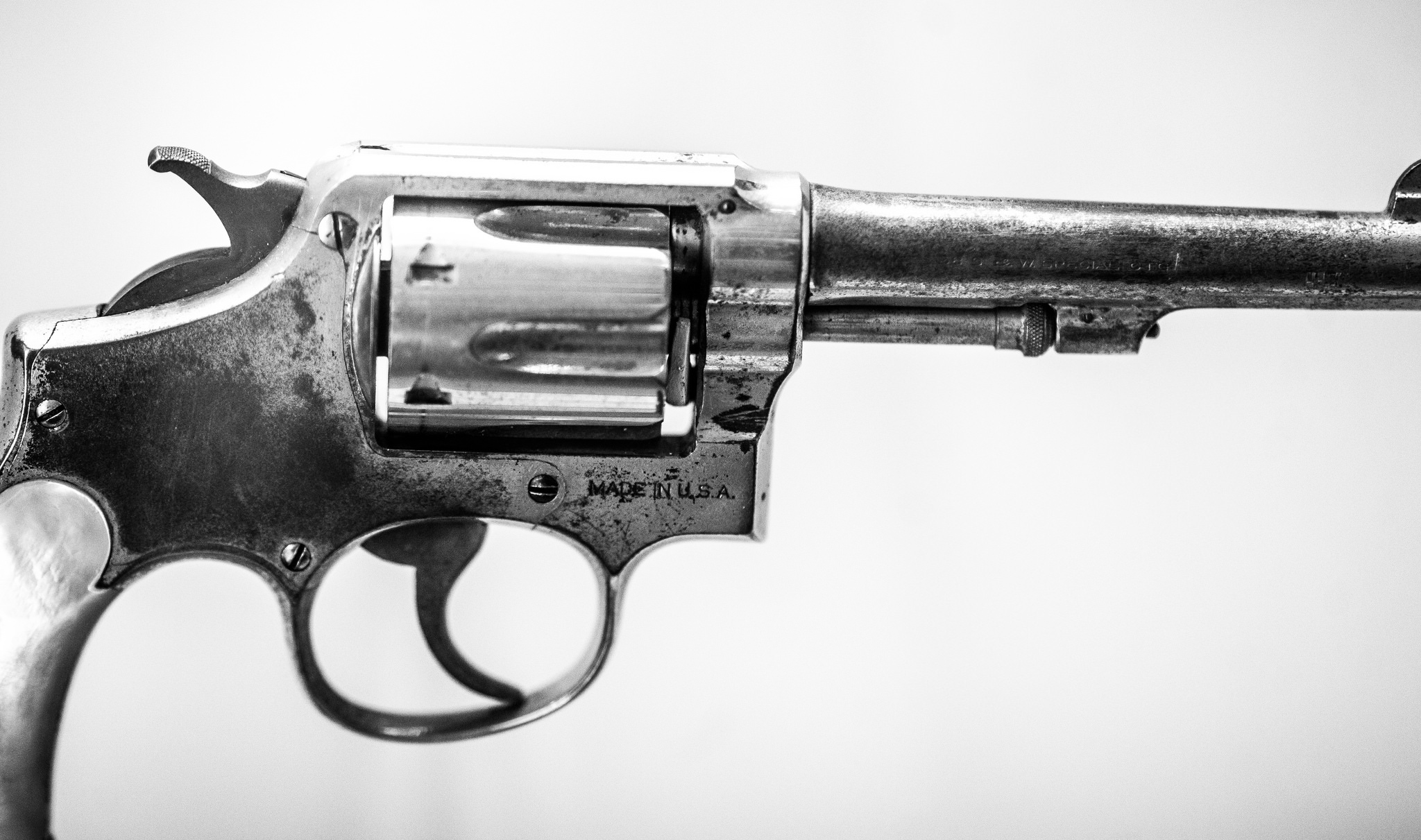A black-and-white photo of a gun.