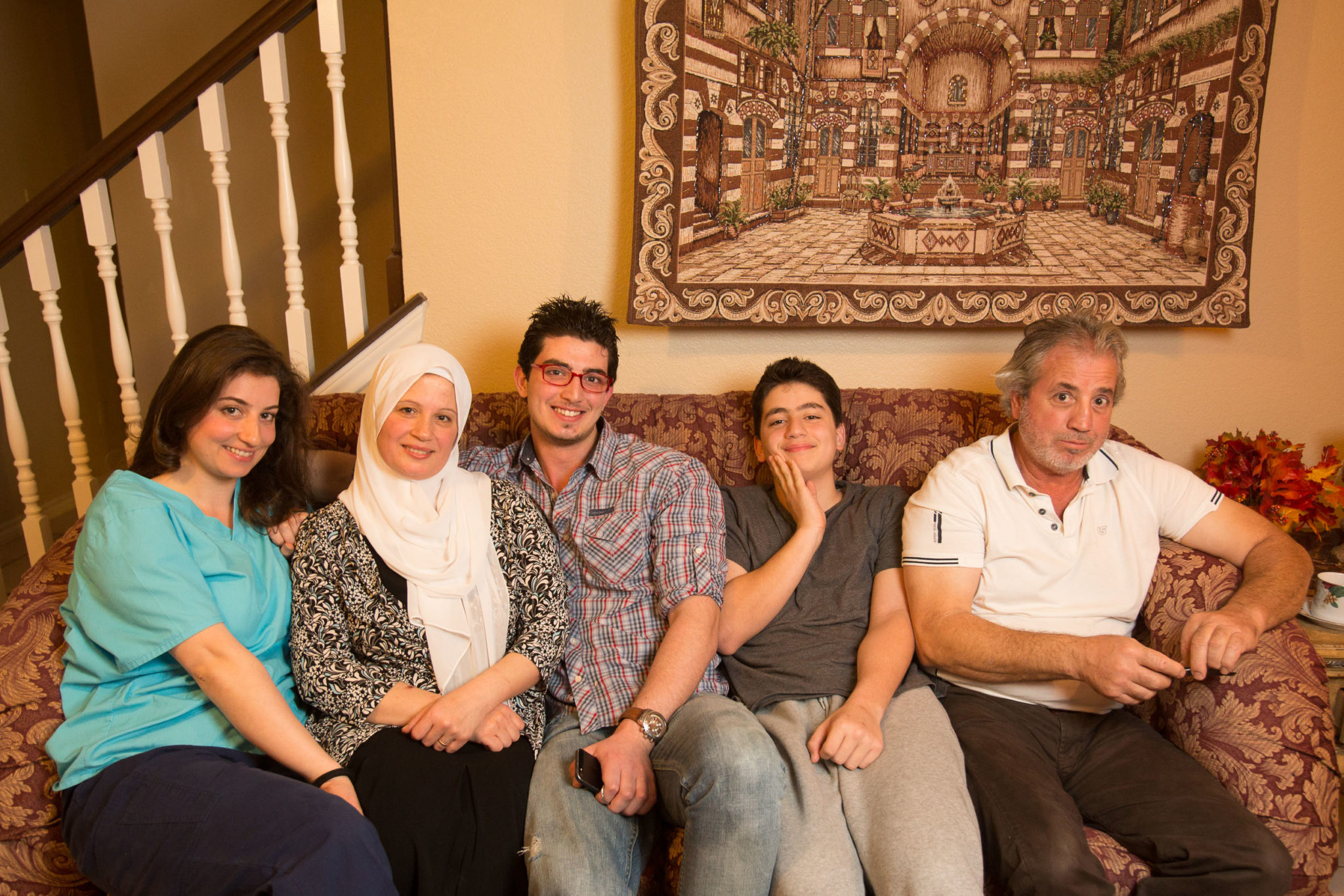 Iyad Al-Afandi (far right) with his wife Lina (second from left), daughter Noor and sons Nawar (center) and Homam at their home in Richardson.