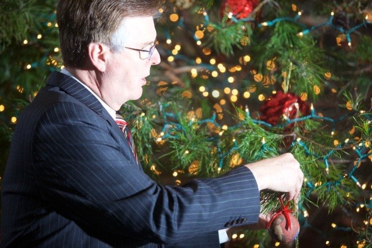 Dan Patrick unveils his Christmas tree in the Texas Senate.