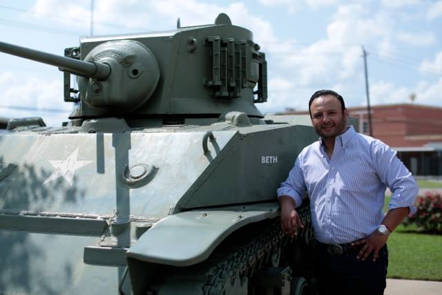 Republicans were more likely to pose with guns than Democrats, but aspiring District 144 Dem Bernie Aldape outgunned 'em all with this tank.