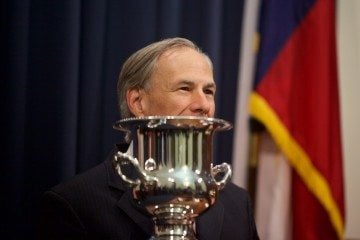 Greg Abbott accepts the Site Selection Governor's Cup for 2015