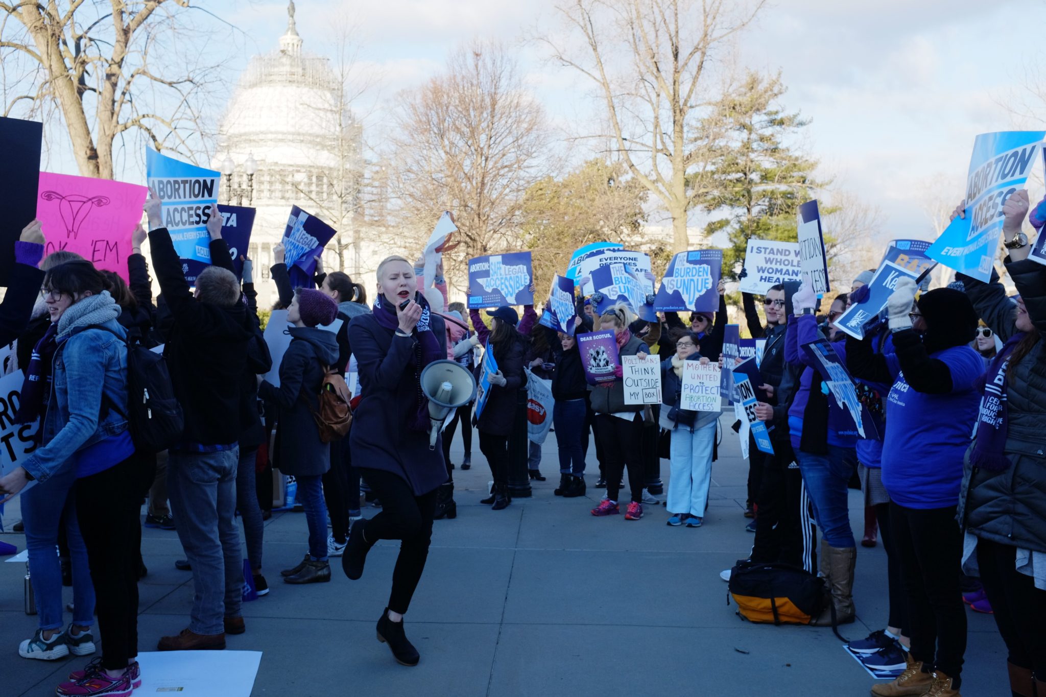 Protesters gather outside the U.S. Supreme Court as judges consider oral arguments in the Texas House Bill 2 abortion case, Whole Woman's Health v. Hellerstedt.