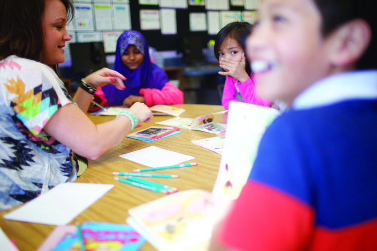 Former refugee students learn about barnyard animals in Melinda Flanagan's fourth grade class at Margaret Wills Elementary School.