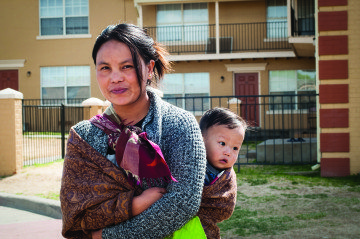 Par Meng and her toddler, Peter Lien, are Burmese refugees who've lived in Amarillo for two years. Now, state leadership wants more input into how refugees are settled across the state.