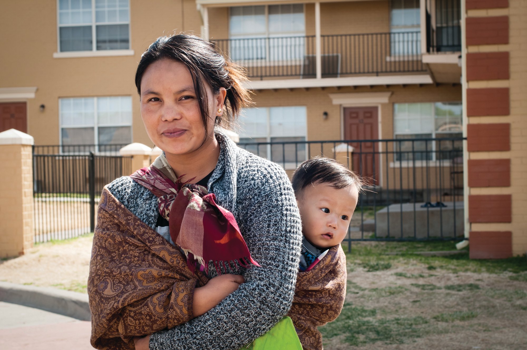 Par Meng and her toddler, Peter Lien, are Burmese refugees who've lived in Amarillo for two years. Local leaders and conservative activists have pressured resettlement groups to bring fewer refugees like them to the city.