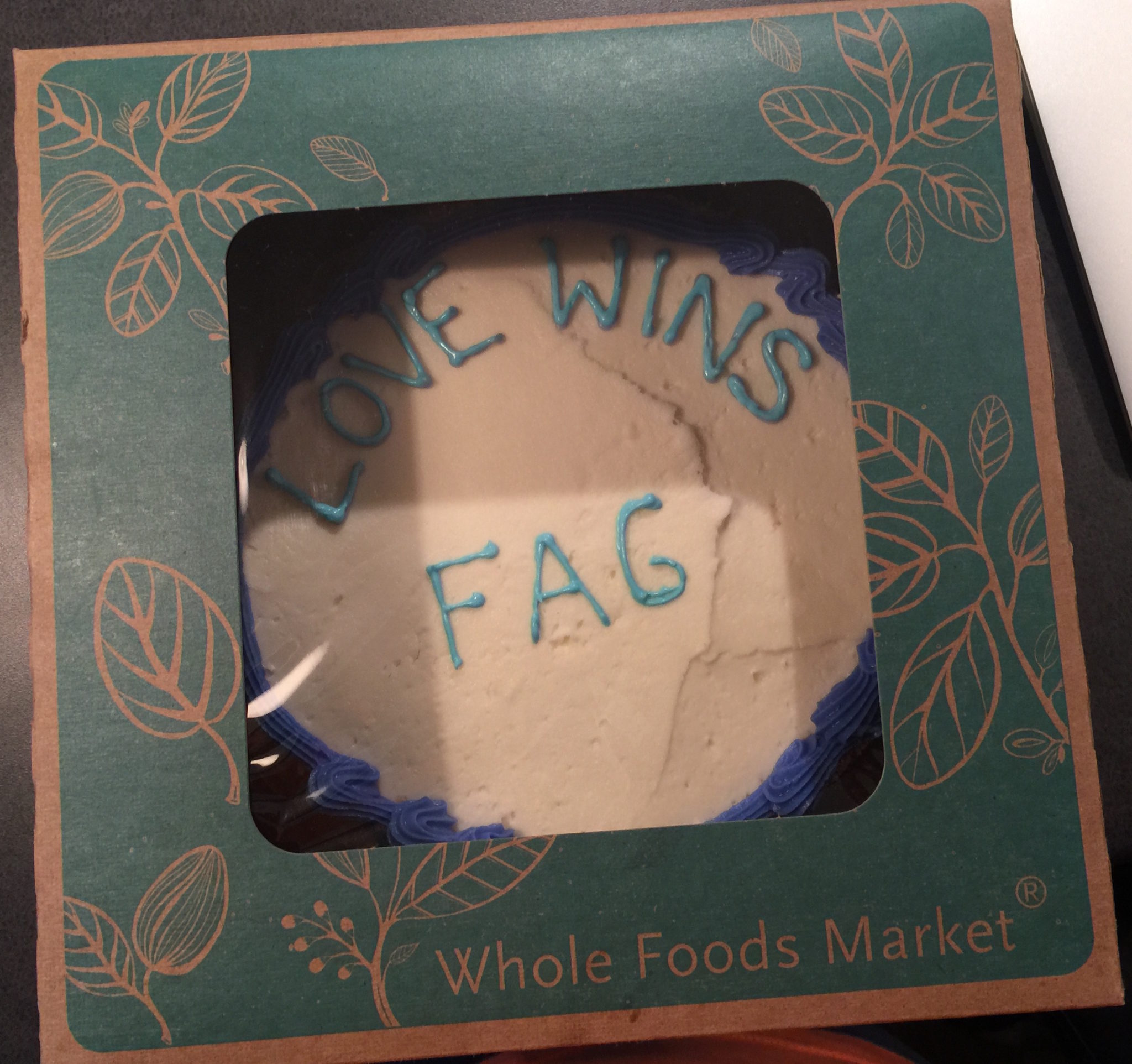 Jordan Brown said he didn't notice the slur on this cake until he was driving home from the Whole Foods flagship store in Austin where he purchased it.