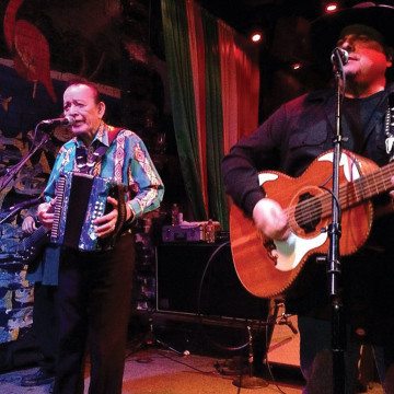 Flaco Jimenez and Max Baca on stage at Flamingo Cantina, Austin, in December 2013.